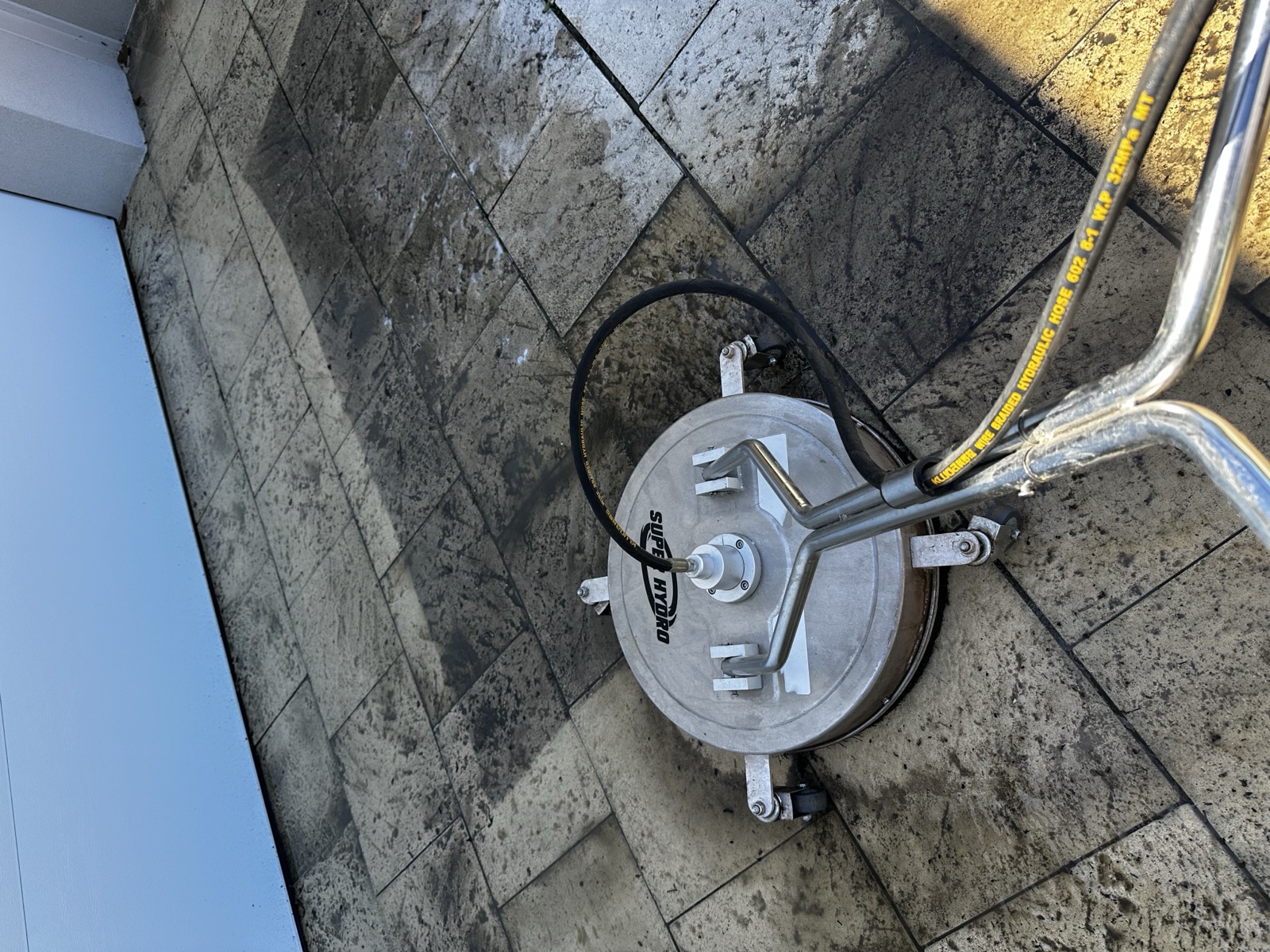 Professional pressure washing surface cleaner on tiles — Exit Property Co